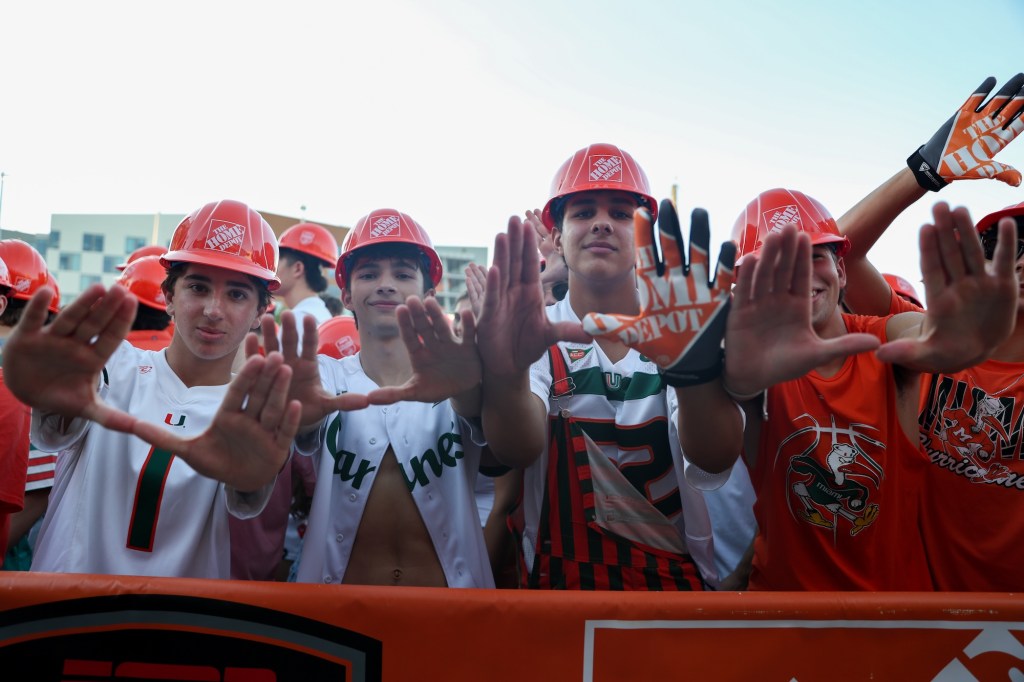 UM fans wearing Home Depot merch at a tailgate