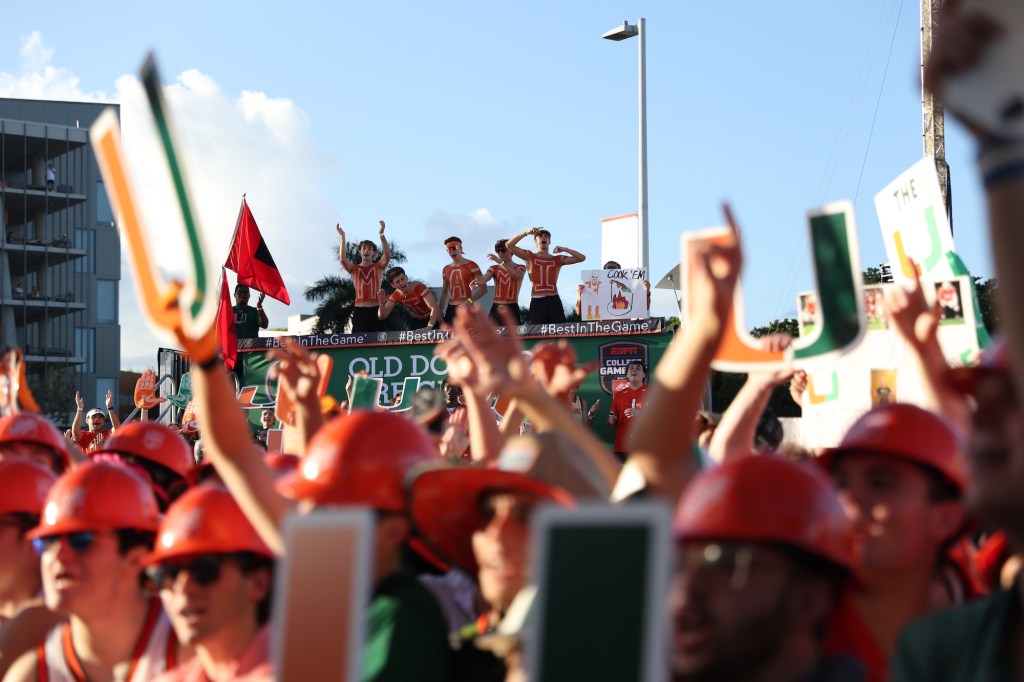a packed tailgate of UM fans