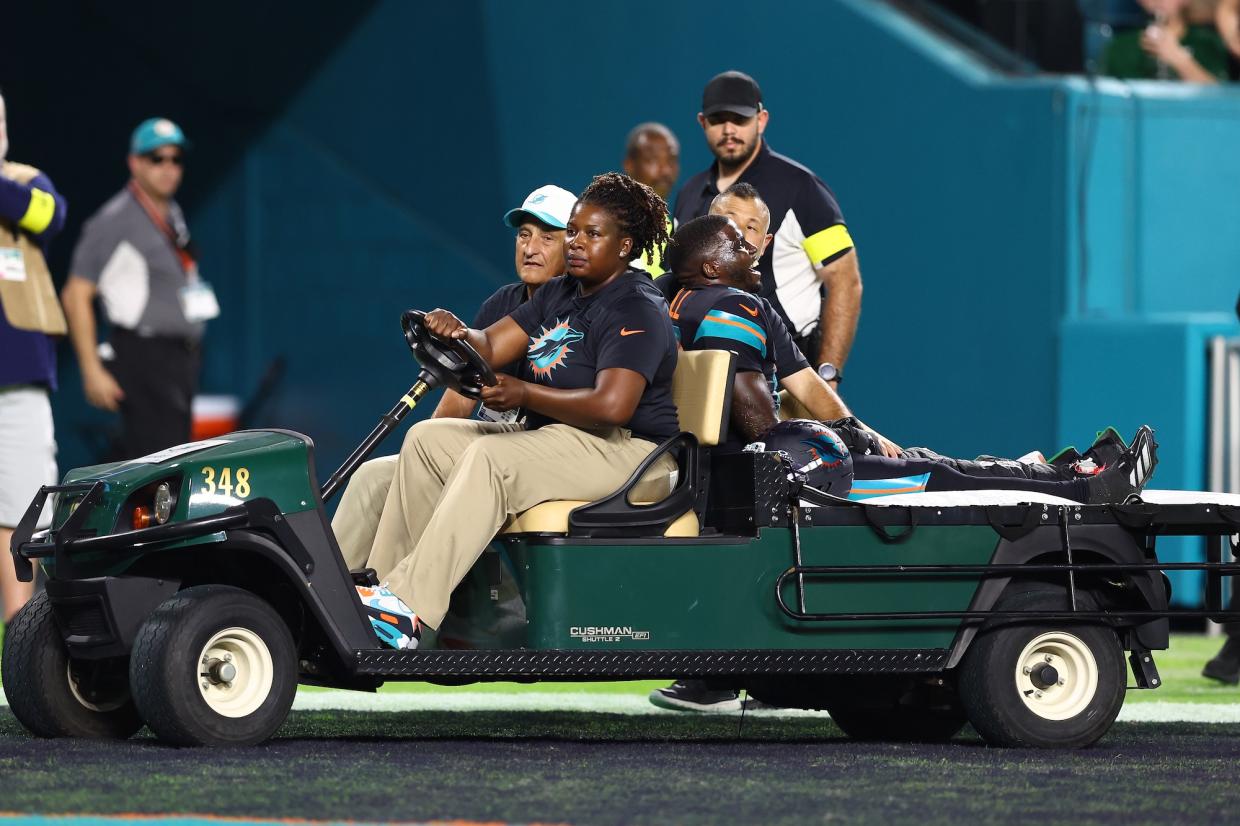 somber moment for Miami Dolphins fans as Tyreek Hill is carted off the field at Hard Rock Stadium