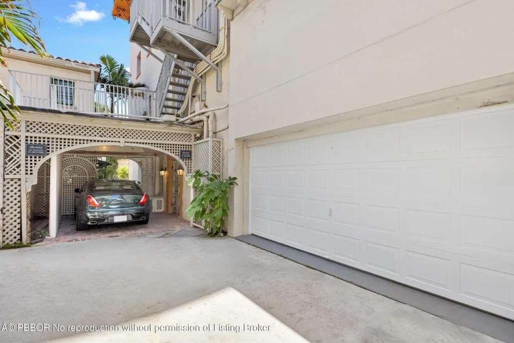 Depicted is a wide, two-car garage.