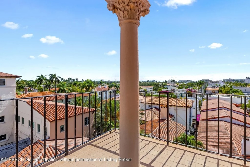 Depicted is one of many towering views of Palm Beach seen from one of the apartment's balconies.