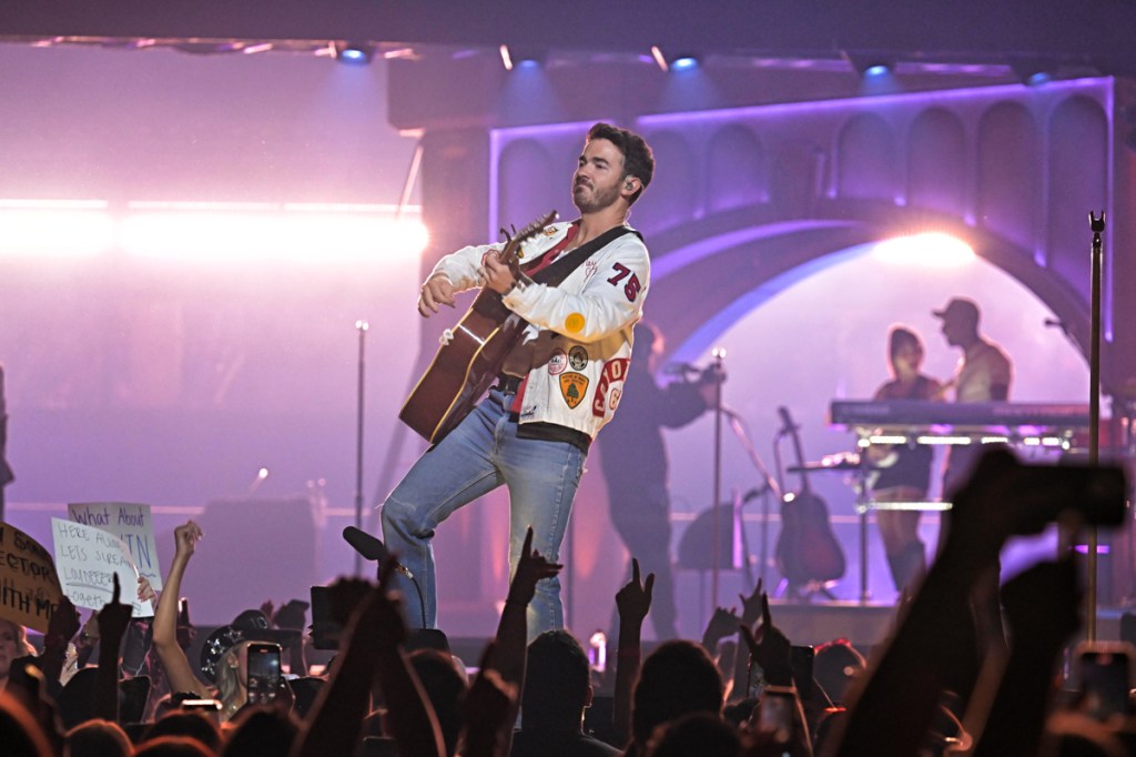 Jonas Brothers perform on stage during the JONAS20: Greetings from Your Hometown Tour at Amerant Bank Arena on Oct. 24, 2025 in Sunrise, Florida.