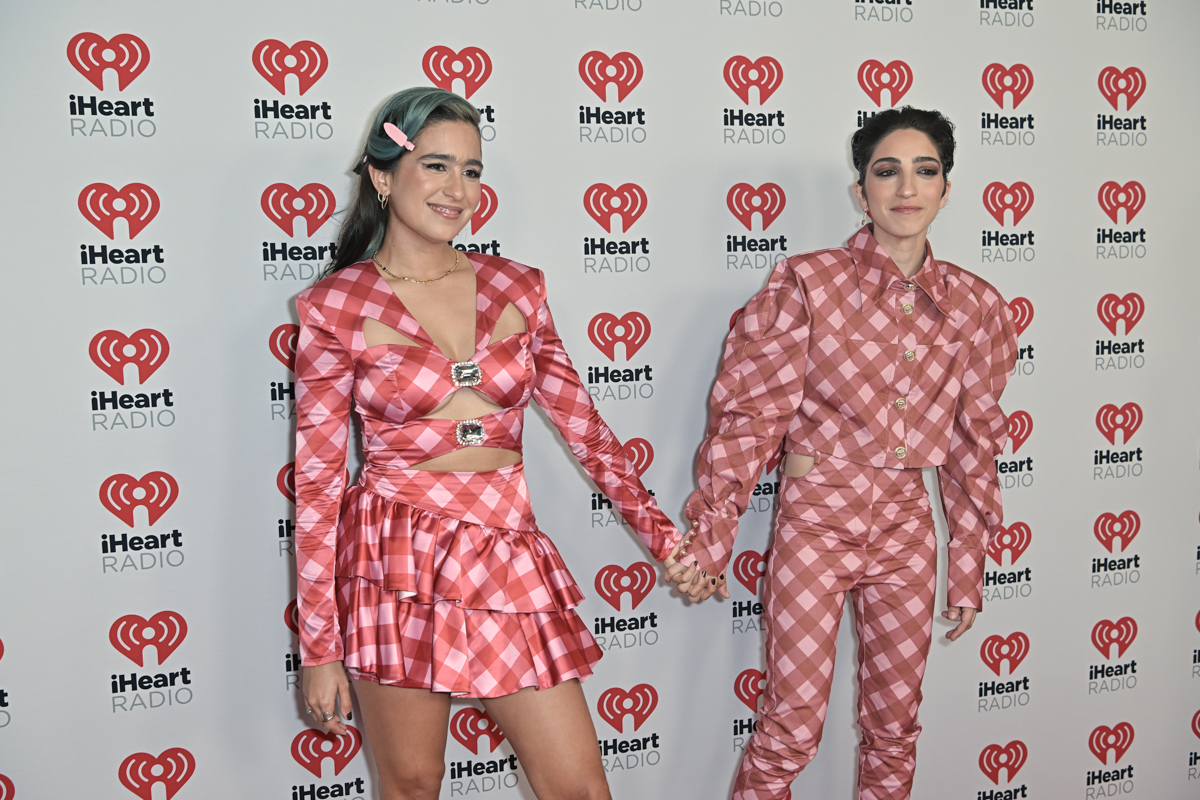 Emily Estefan and Gemeny Hernandez arrive to iHeartRadio Fiesta Latina at Kaseya Center on Oct. 21, 2023 in Miami, Florida.