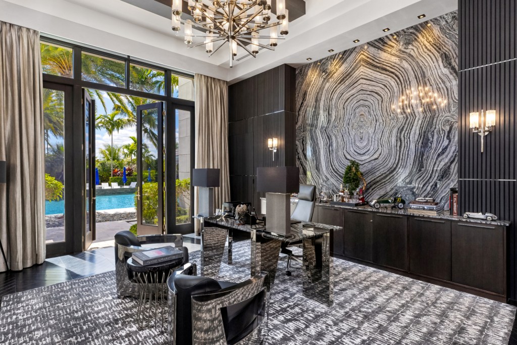 The office designed with marble and black and chrome furniture