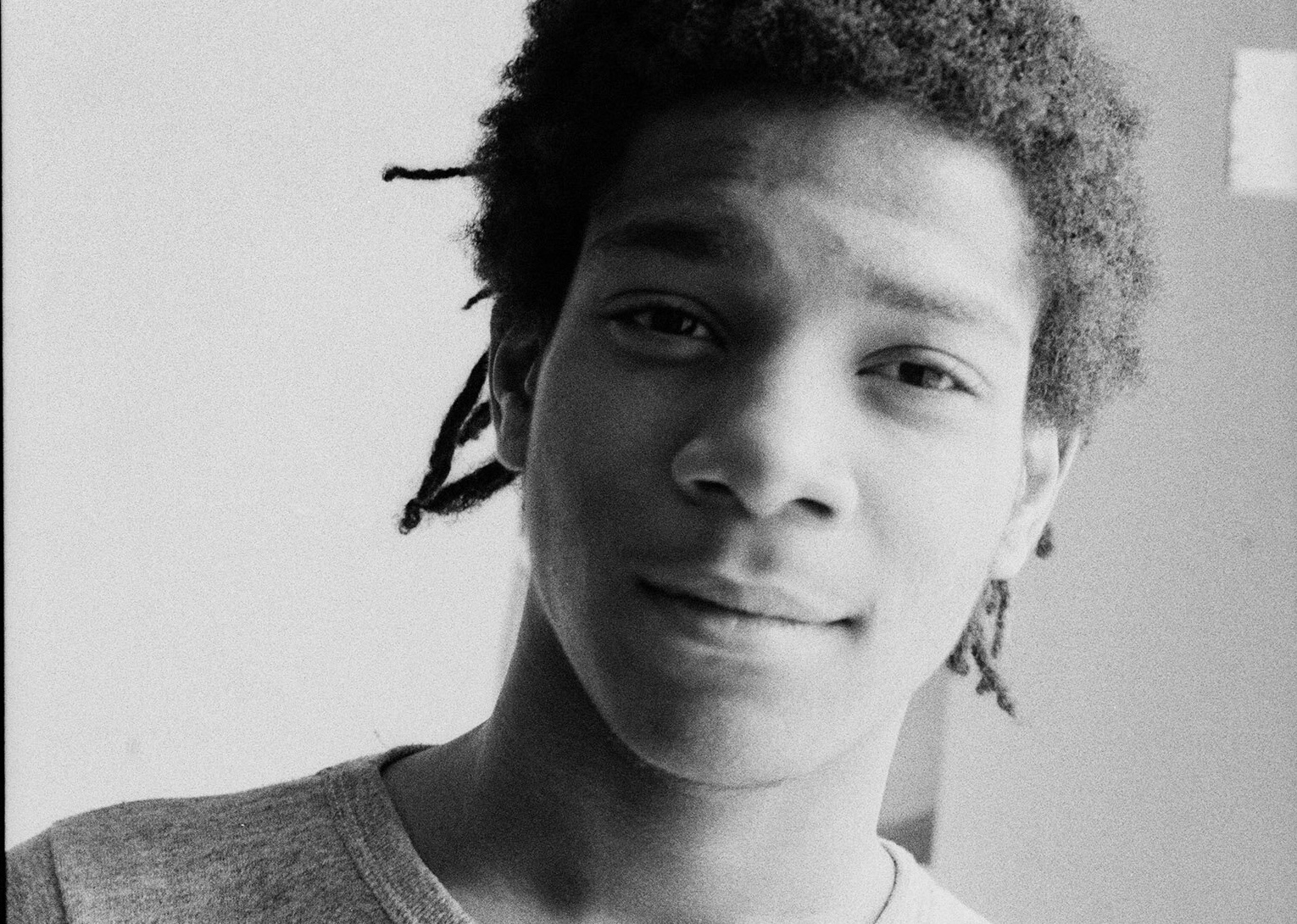 black-and-white photo of a young Jean-Michel Basquiat