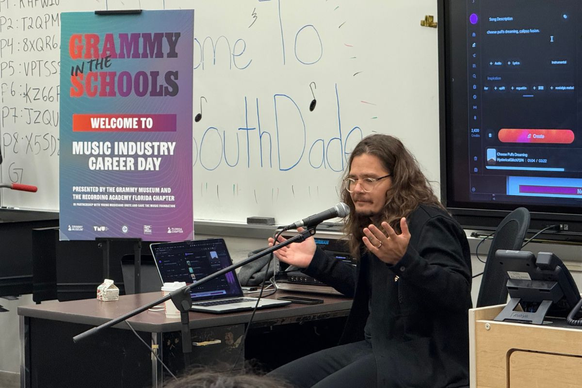 A music professor at a high school teaching