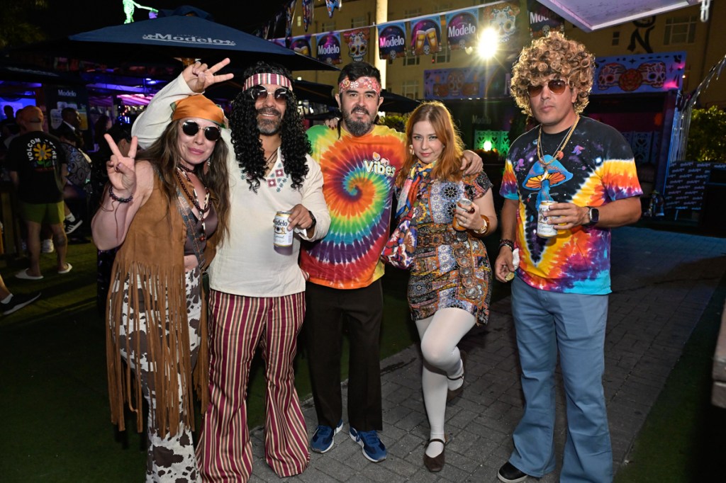 photo of five people dressed as hippies for Halloween