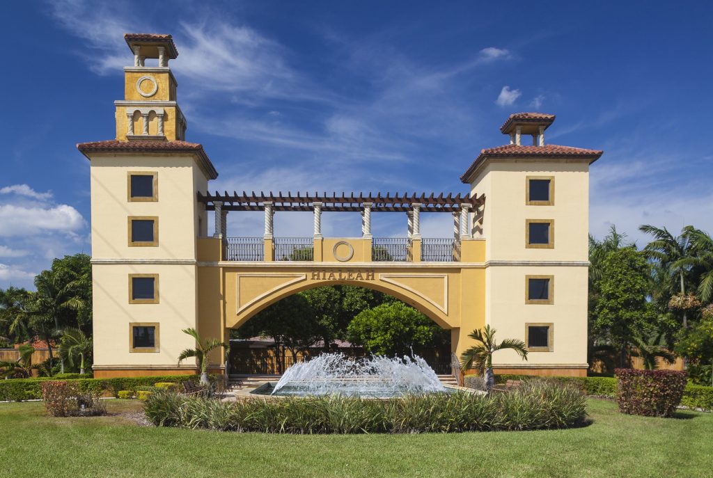 A photo of the iconic gate at the entrance to the Miami suburb of Hialeah on a bright sunny day