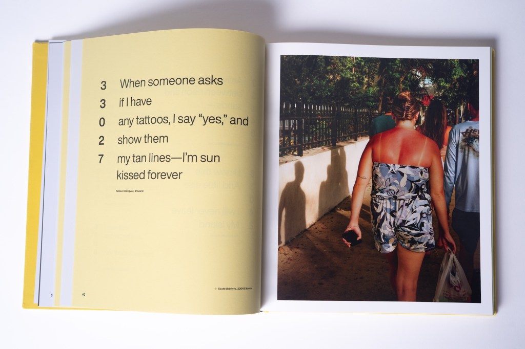 Photo of an open book. The page on the left shows a poem printed on a yellow background. It reads, "When someone asks if I have any tattoos, I say 'yes,' and show them my tan lines — I'm sun kissed forever"