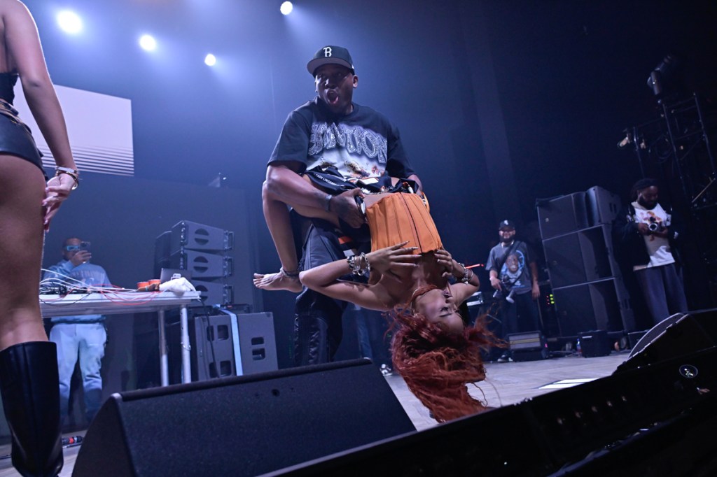 People dancing on stage.