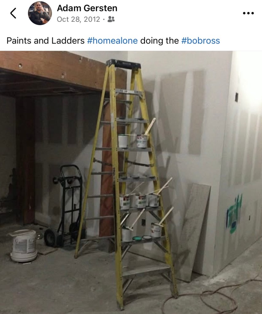 screenshot of a Facebook post by user Adam Gersten, date-stamped October 28, 2012, reading, "Paints and Ladders #homealone doing the #bobross." The attached photo shows a ladder beside unpainted walls