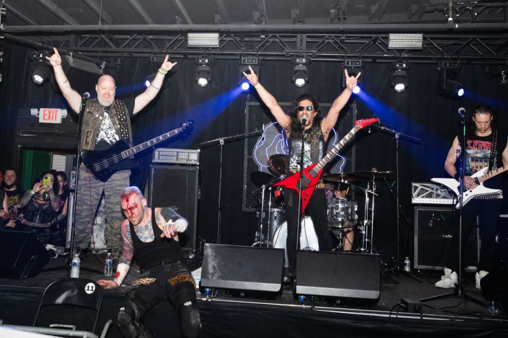 a metal band on stage