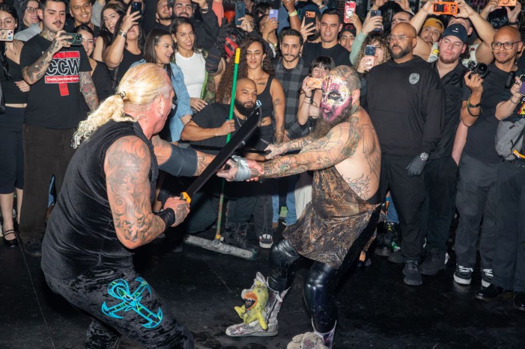 Photo of two wrestlers at a deathmatch 
