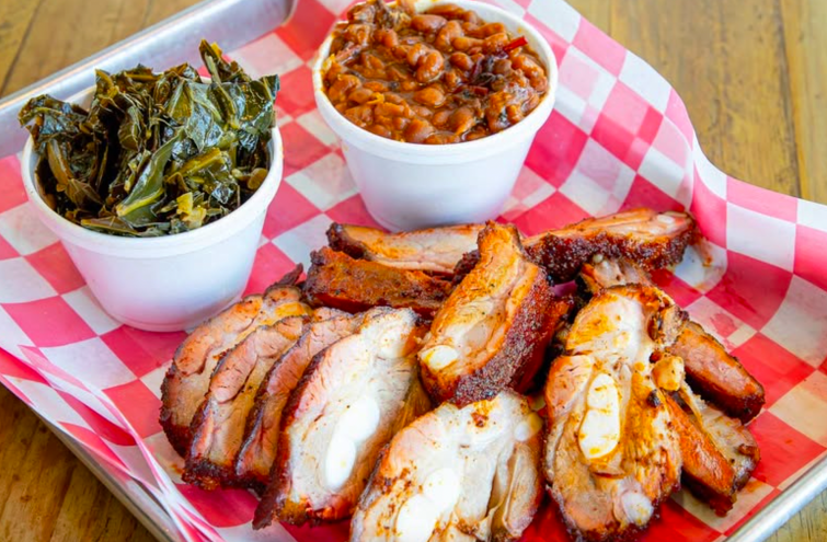 barbeuce platter with collard greens and baked beans