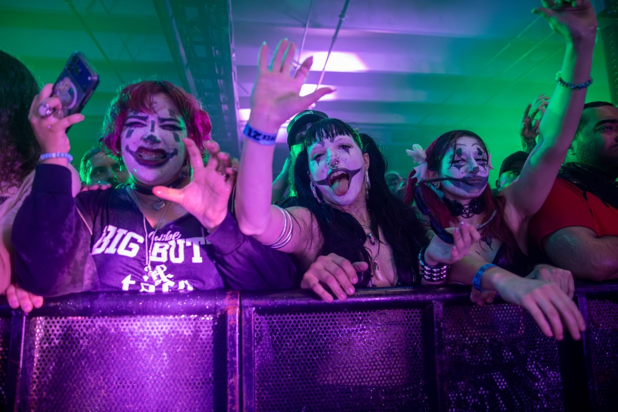 Photo of people with their face painted at the Juggalo Weekend’s First Night in Miami