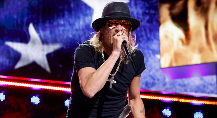 Photo of Kid Rock singing on stage