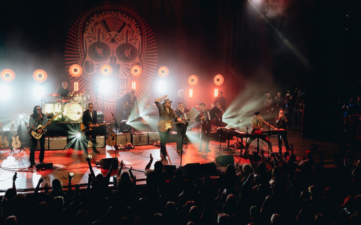 Photo of country band The Mavericks on stage.