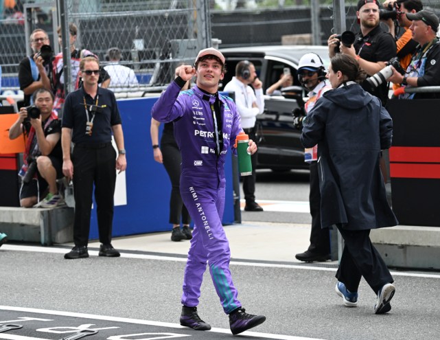 photo of Mercedes driver Kimi Antonelli fist pumping to a crowd in the stands at the Miami Grand Prix