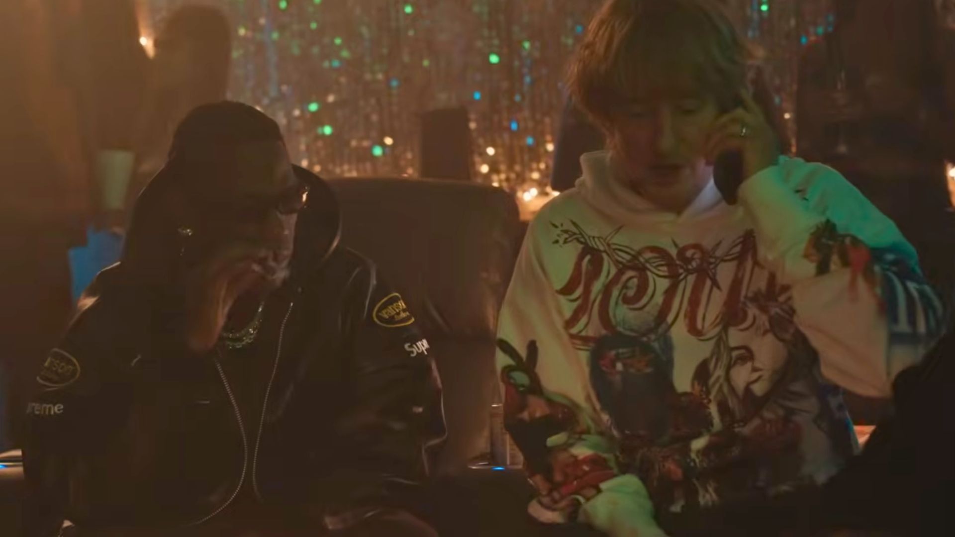 Photo of Owen Wilson and Travis Scott