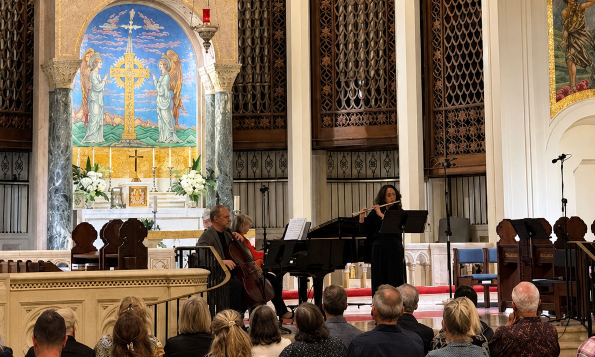 Photo of an orchestra performing inside a church in Miami.
