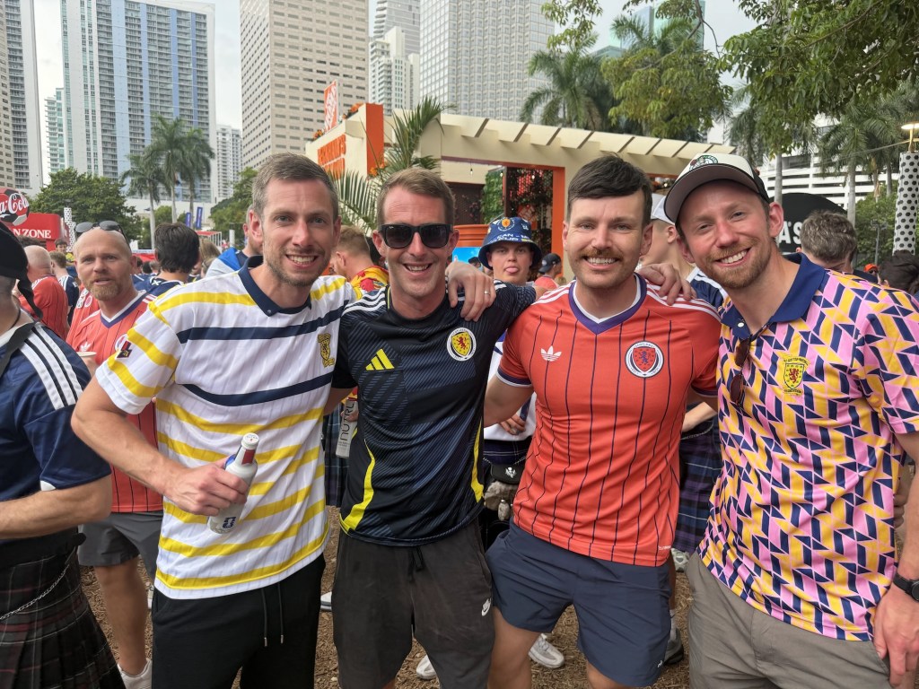 Four Scottish fans pose at FIFA Fan Festival during the World Cup in Miami
