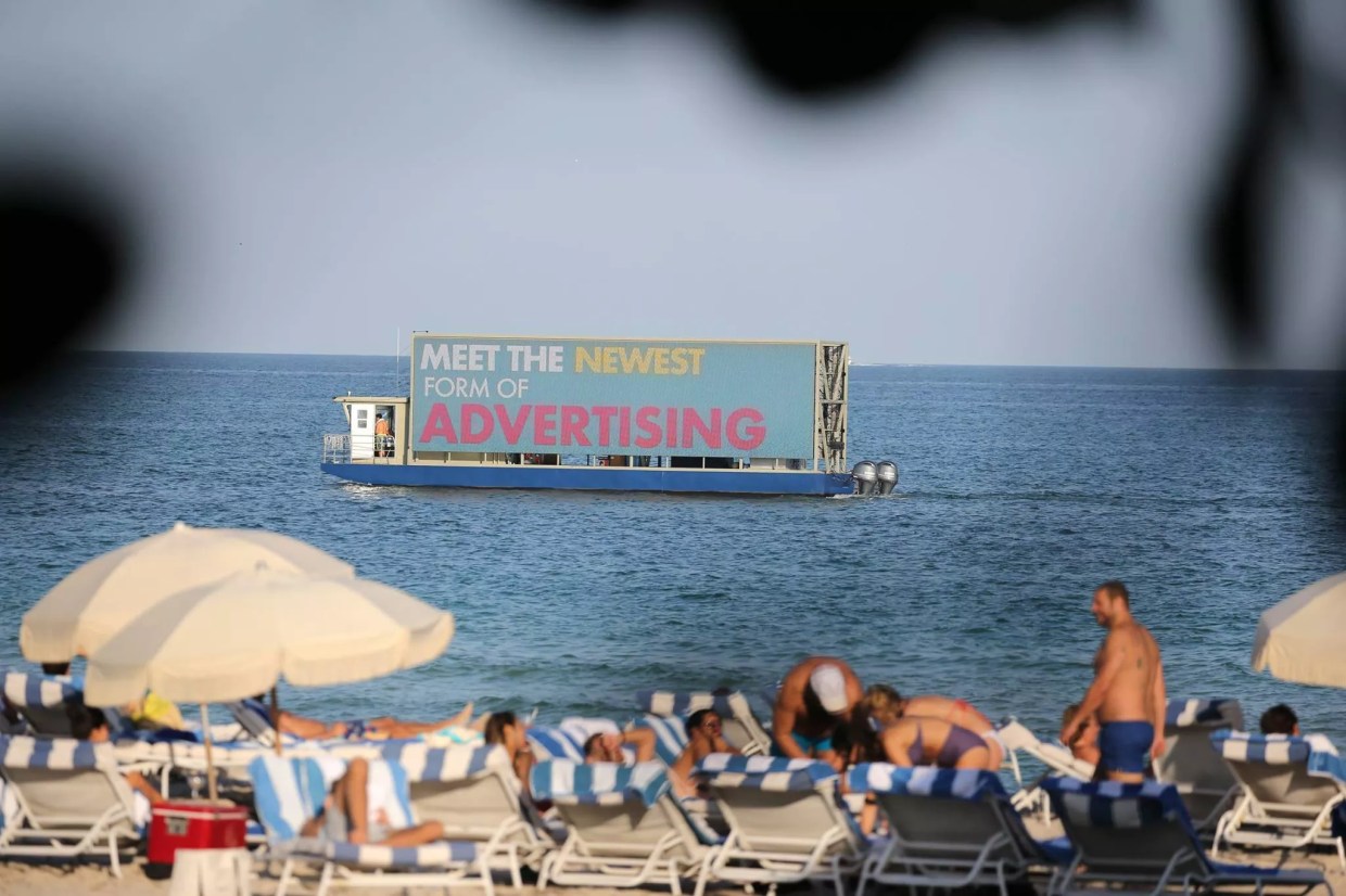 After Voting to Ban Floating Billboards, Miami Beach Mayor Levine Uses One