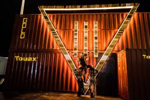 Photo of shipping containers with logo of III Points Festival