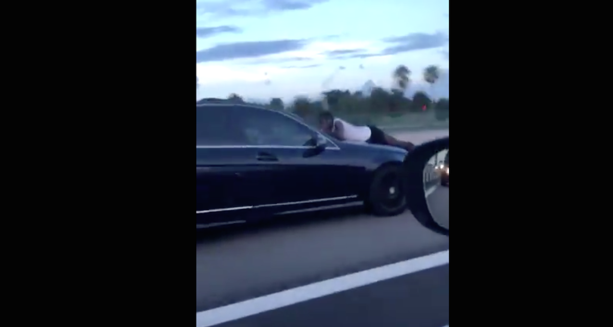 Video: Man Hangs Onto Hood of Car Speeding in I-95 Express Lane