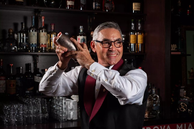 A man making a cocktail