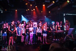 Young camper of Miami Girls Rock Camp on stage