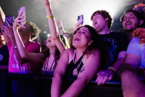 Fans cheering from the front row at the Fillmore Miami Beach