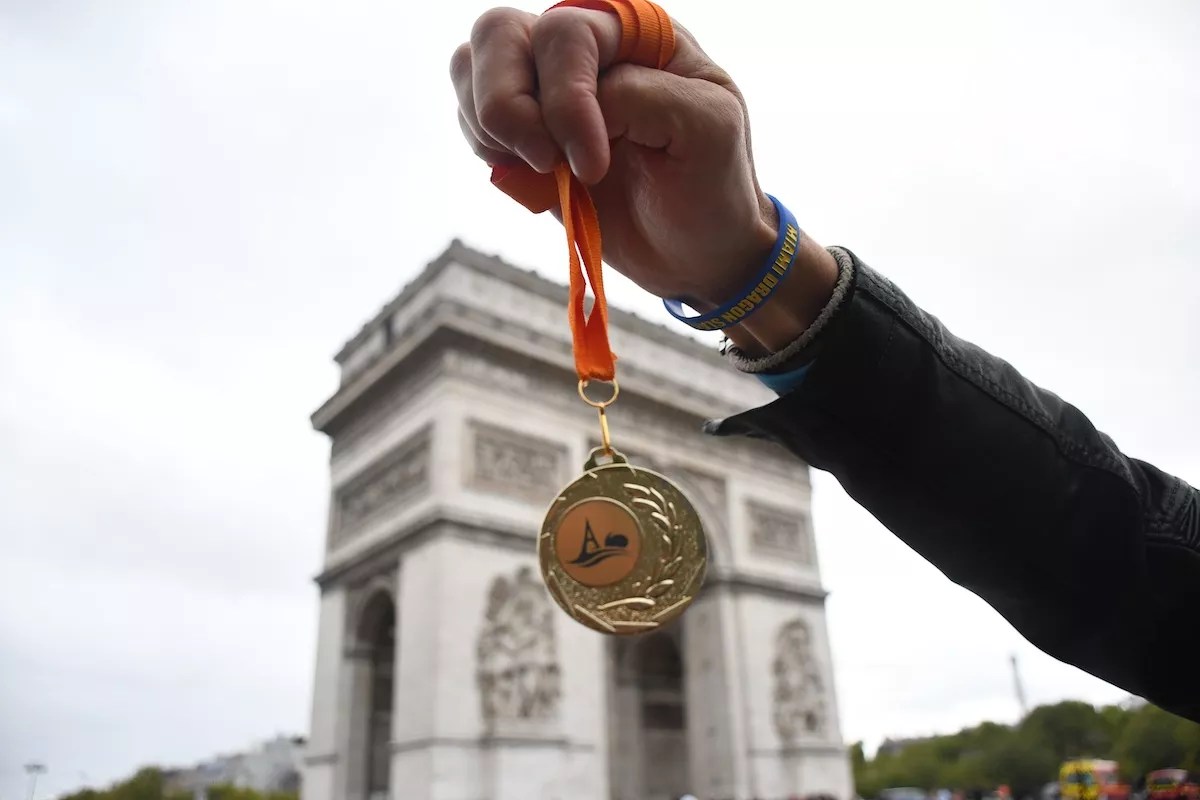 Miami Crew Braves Wind, Chill, and Rain to Win La TraverSeine Dragon Boat Race in Paris
