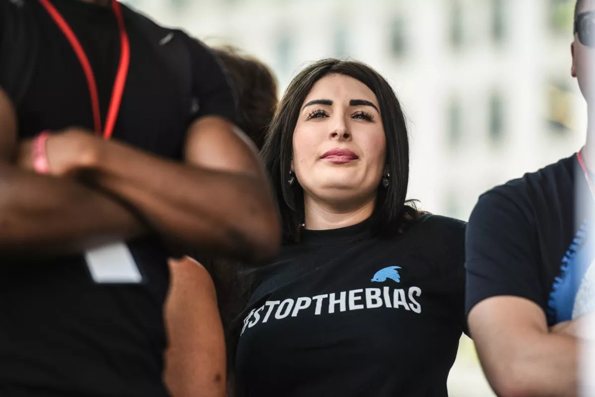 Laura Loomer wears a black t-shirt that reads "Stop the Bias"