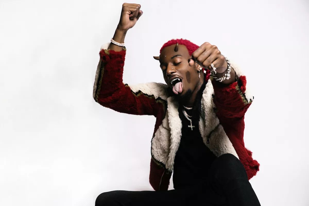 Playboy Carti with horns growing out of his forehead