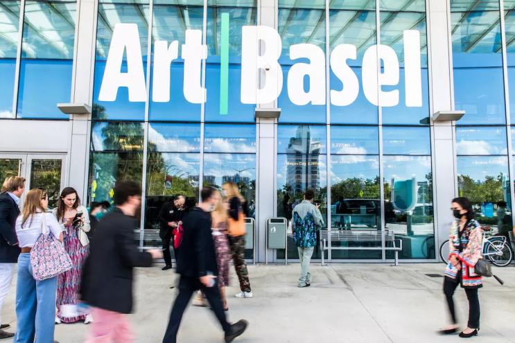 People standing outside the Miami Beach Convention Center during Art Basel 2021.
