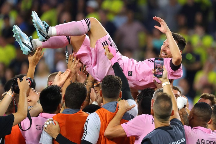 Soccer superstar Lionel Messi is hoisted by his teammates after Inter Miami's first tournament win