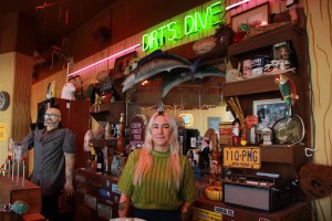 Kelly Breez in front of her art installation, Dirt's Dive