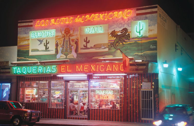 A vintage neon sign on a restaurant