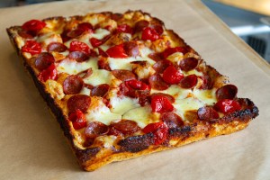 A Detroit-style pizza with toppings