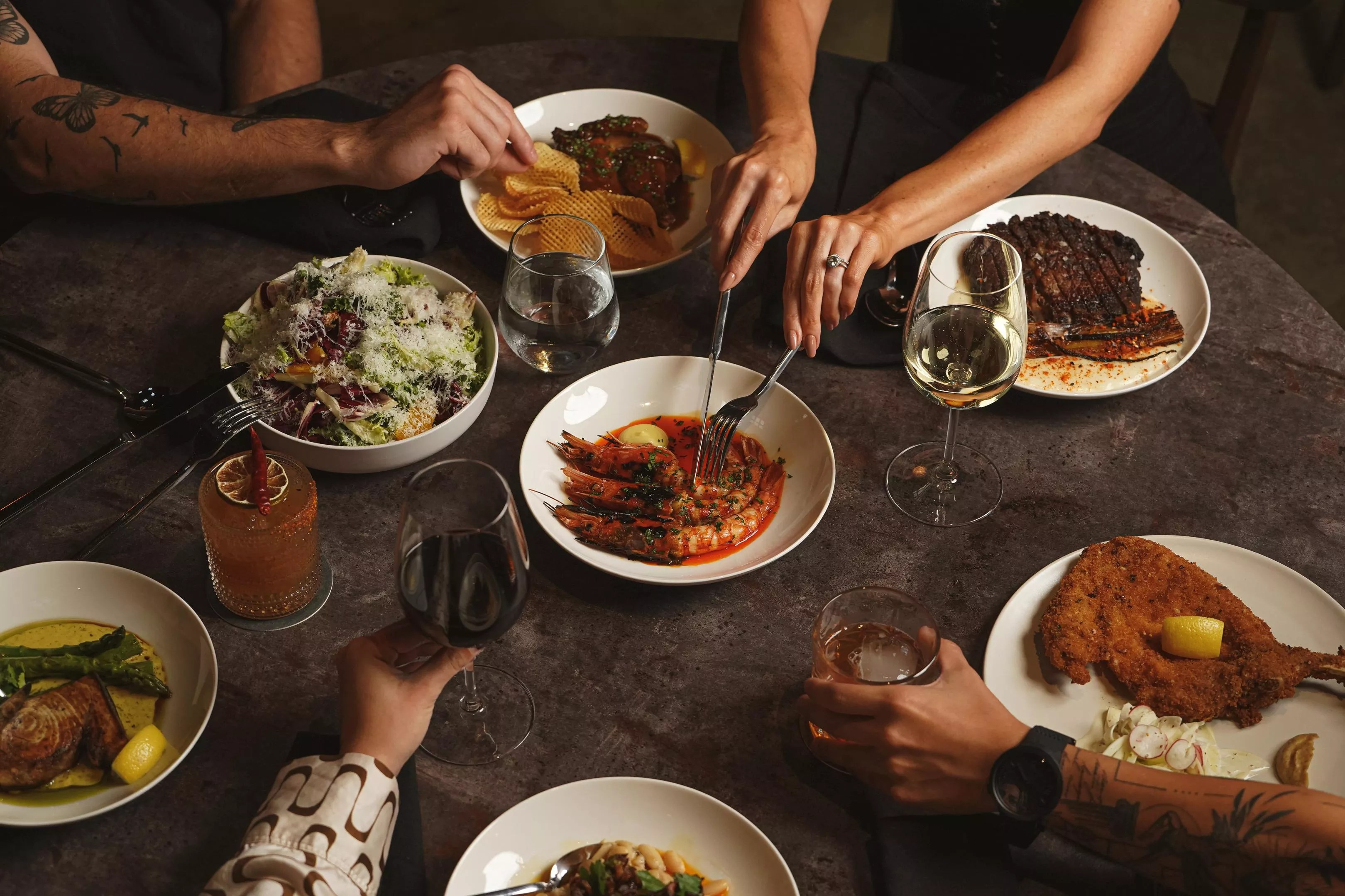 Hands grabbing a meal