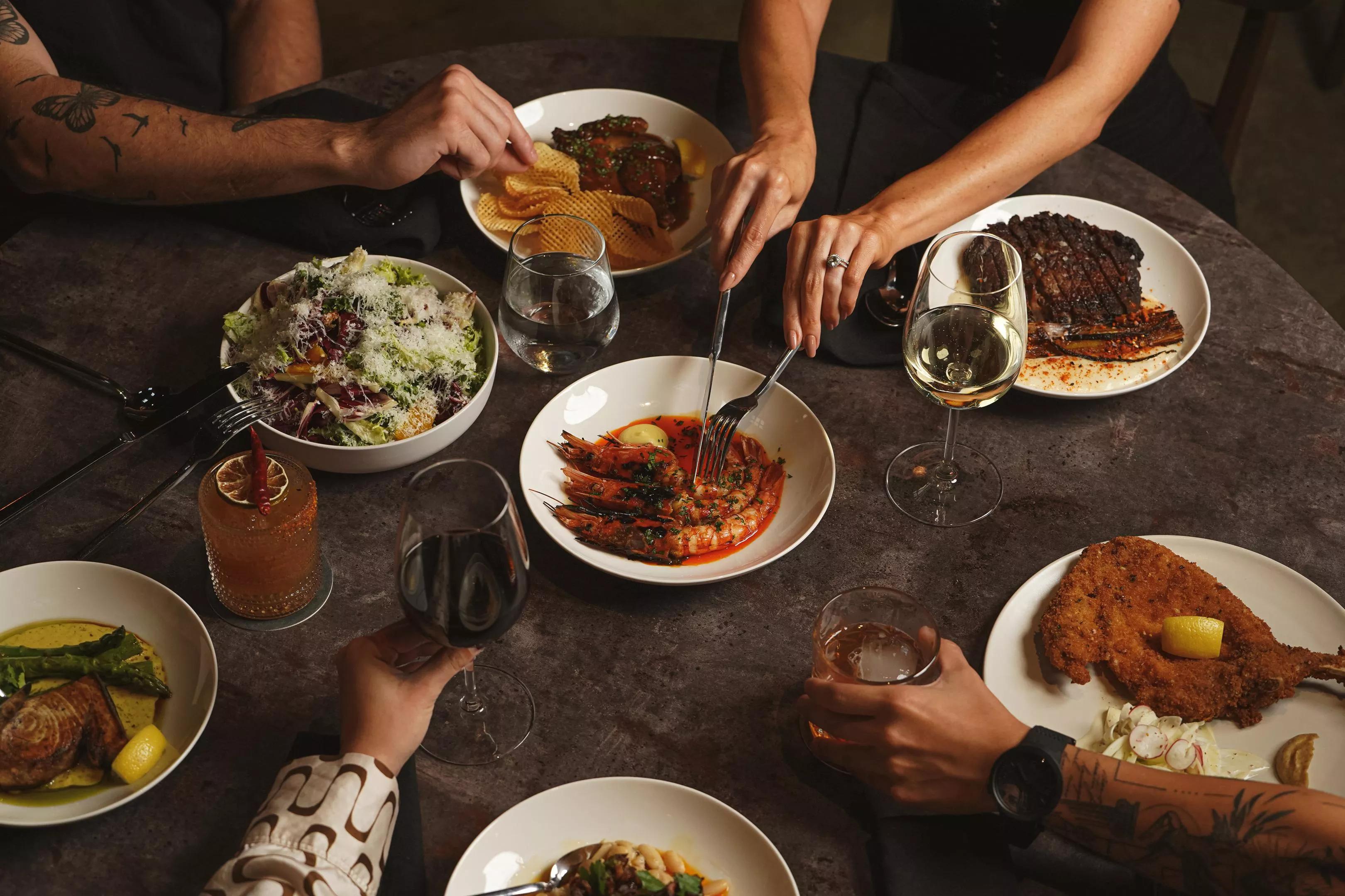 Hands grabbing a meal