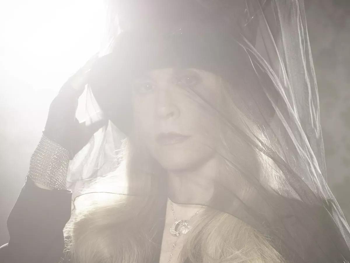 Stevie Nicks wearing a hat and veil