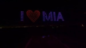 Drones spelling out I heart MIA in the night sky