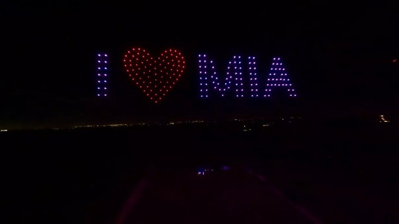 Drones spelling out I heart MIA in the night sky