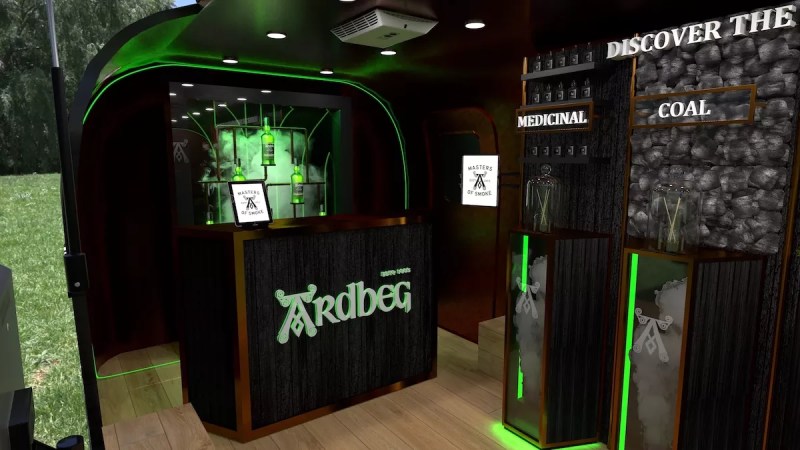 A dark venue with green neon lights