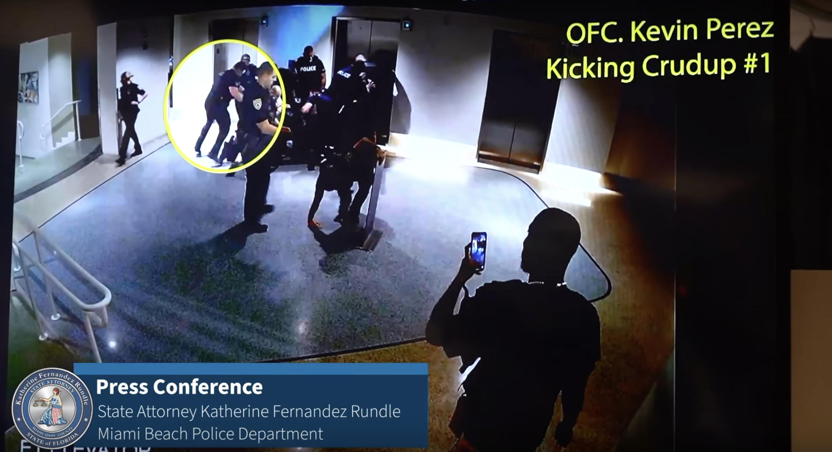 Miami Beach police officer Kevin Perez kicks Dalonta Crudup