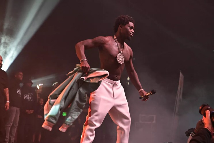 New Times file photo of Kodak Black performing shirtless, onstage