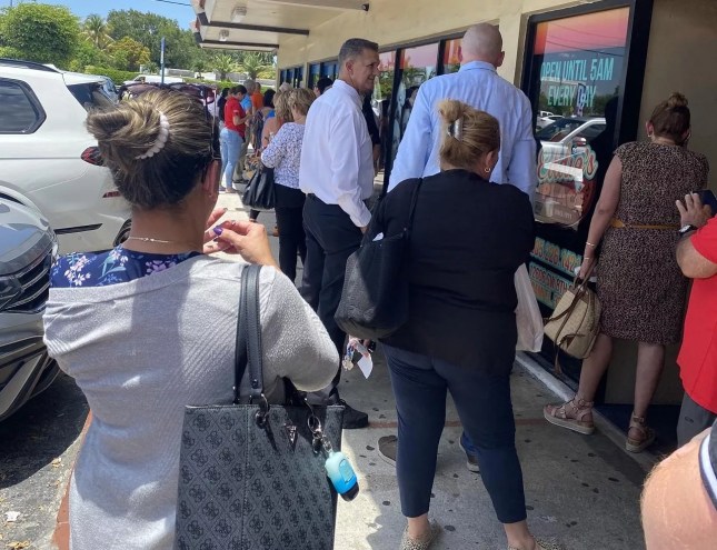 People in line at Miami dry cleaner