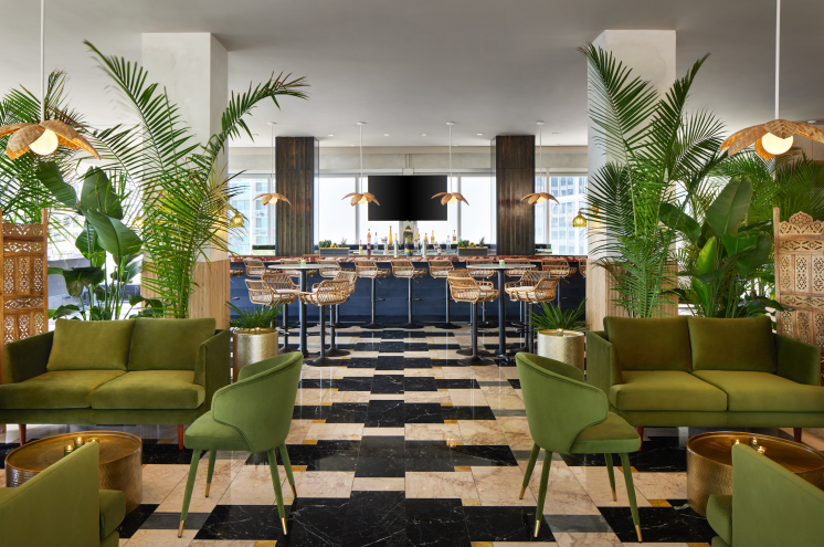 an earthy dining room with greenery