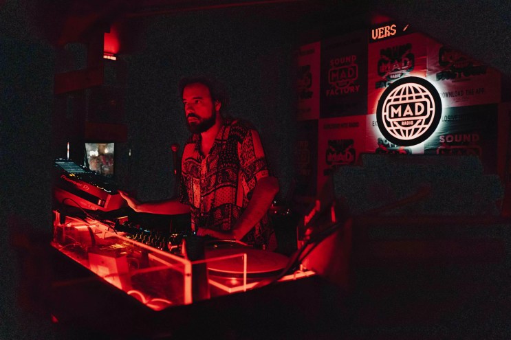 DJ spinning ay Mad Radio Miami